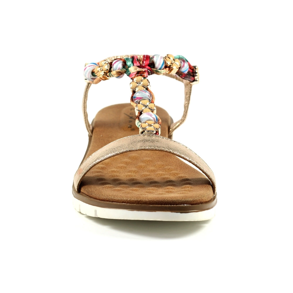 Lunar Gold sandal with a decorative strap on a white background