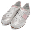 video of person wearing ara 12-50904 White silver sneaker with pink accents on a white background