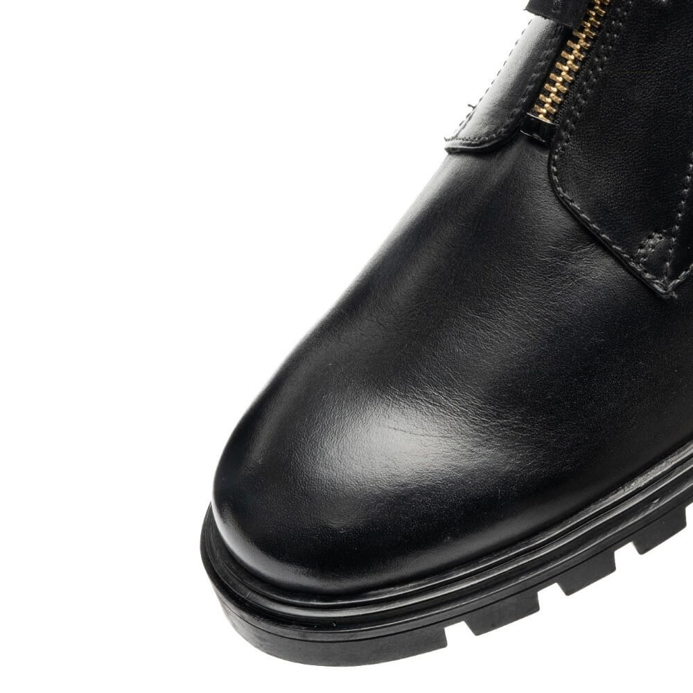 Video of ara Black leather ankle boots with side zippers and gold-tone hardware, shown on a model wearing grey trousers against a white background.