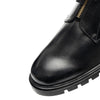 Video of ara Black leather ankle boots with side zippers and gold-tone hardware, shown on a model wearing grey trousers against a white background.